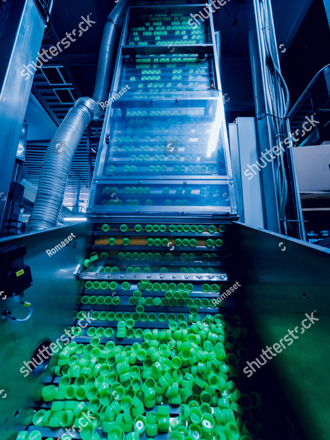 stock-photo-beverage-factory-interior-conveyor-with-bottles-for-juice-or-water-modern-equipments-1089659336